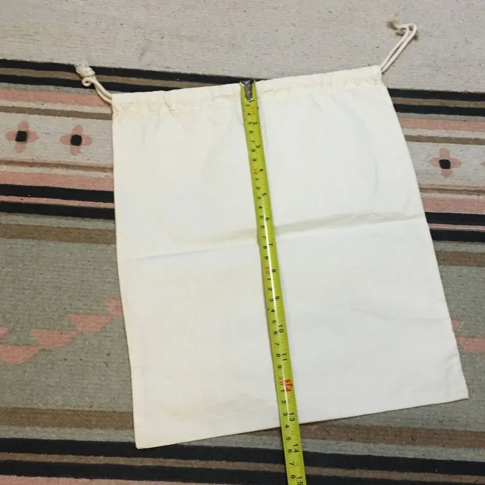 Johnny Was medium Off White drawstring dustbag logo on front Garment bag